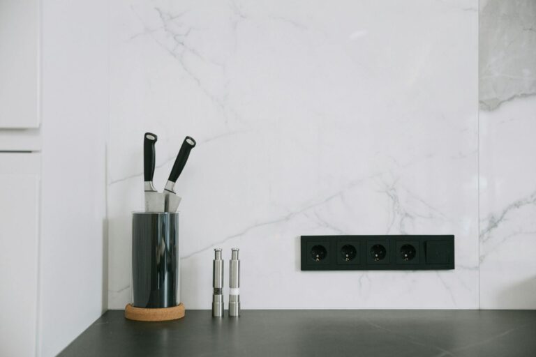 photo of a concealed kitchen outlet and a set of knives