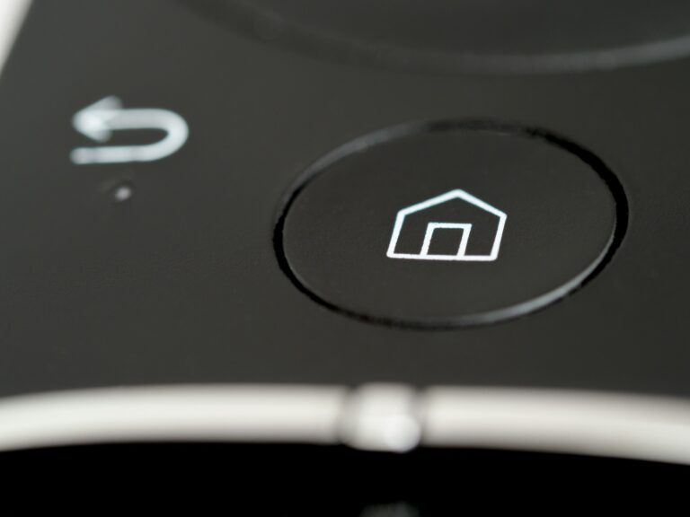 Photo display a device button with a home icon