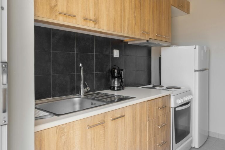 kitchen cabinetry brown cabinets and a sink