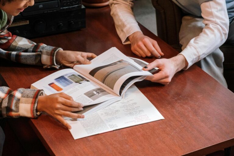 Hands Holding a Magazine