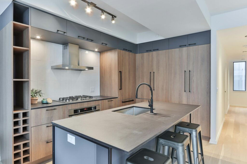 New Jersey Kitchen Must Haves - white wooden kitchen cabinet with stainless steel faucet
