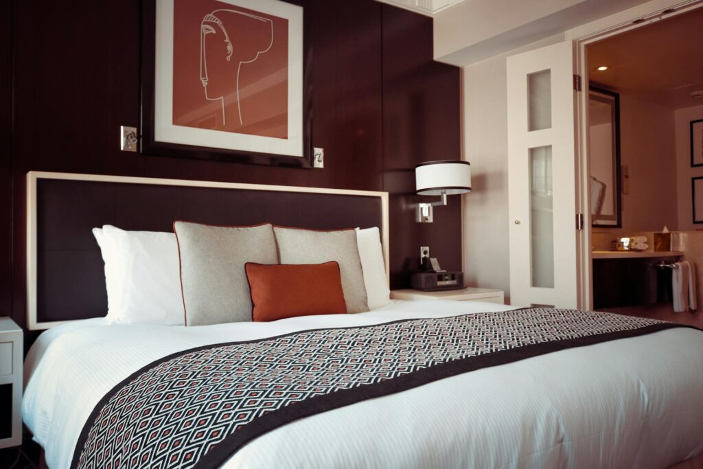 In-law suite - Black and Grey Bedspread on Bed and Pillow