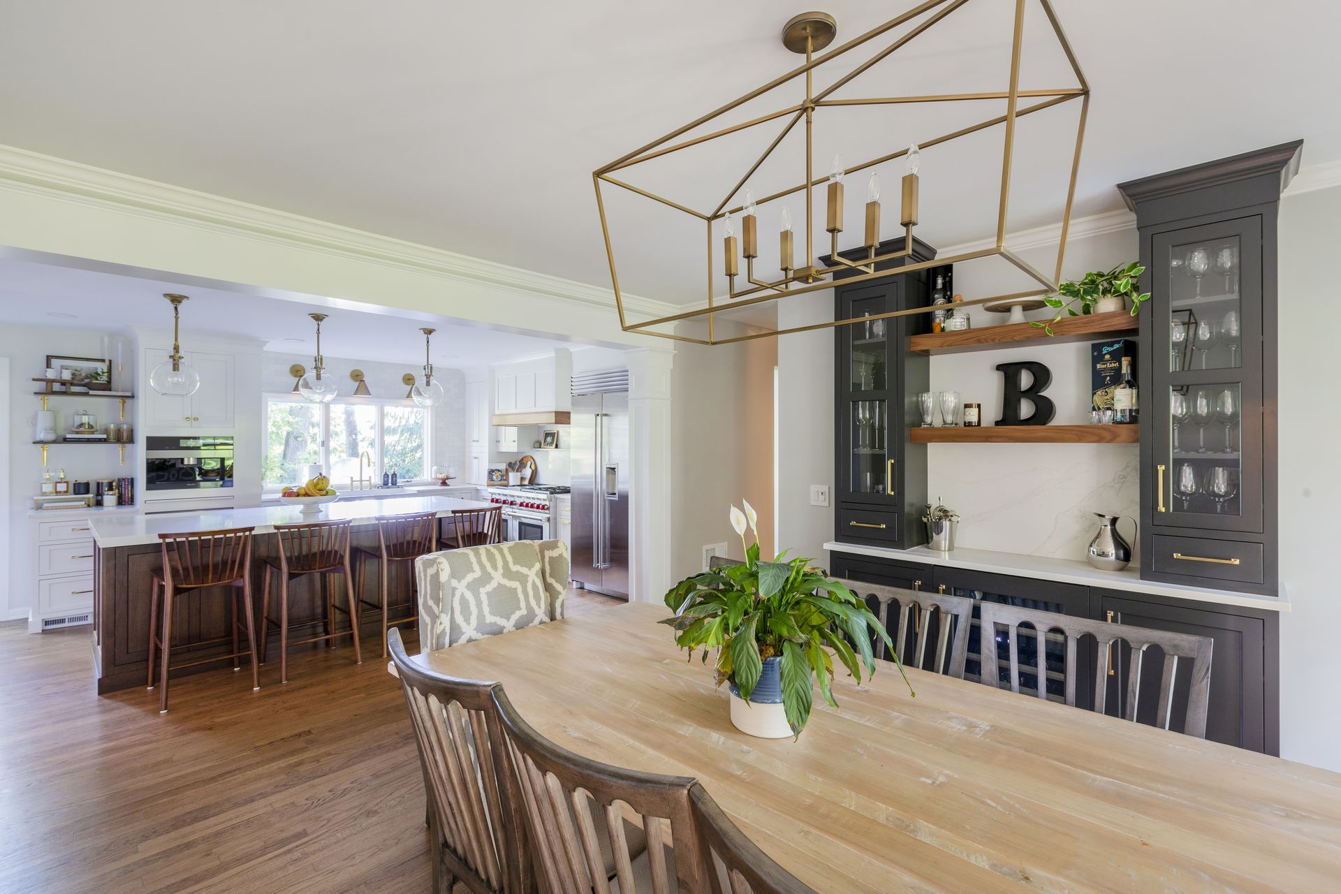 Kitchen Remodeling - Structural Remodeling & Kitchen Expansions. Warm open-concept kitchen and dining area
