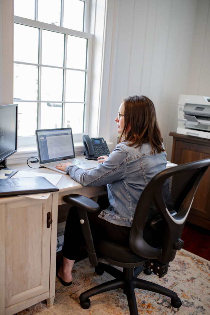Carly Gockeler working on computer