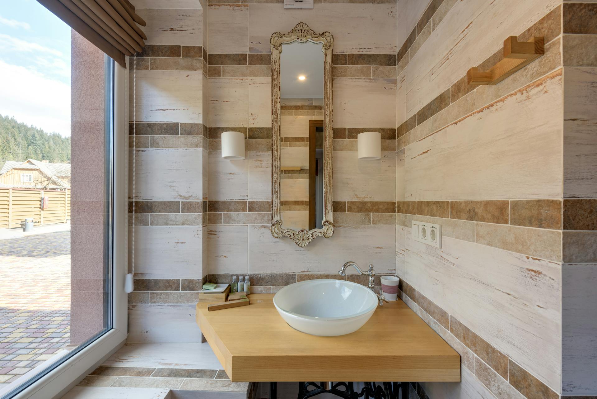 Modern hall bathroom with smart mirror and layered lighting