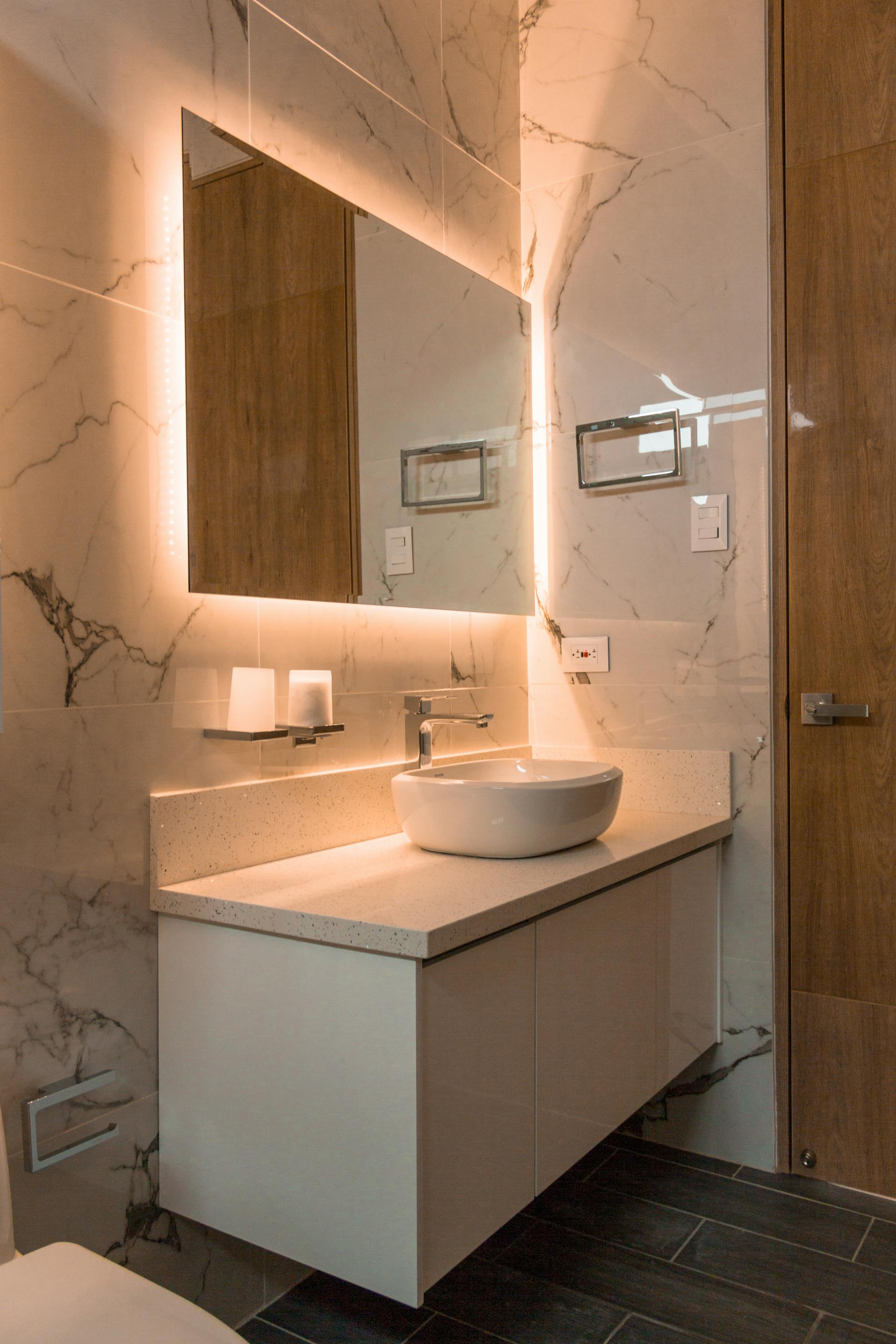 Hall bathroom with walk-in shower and built-in wall niche