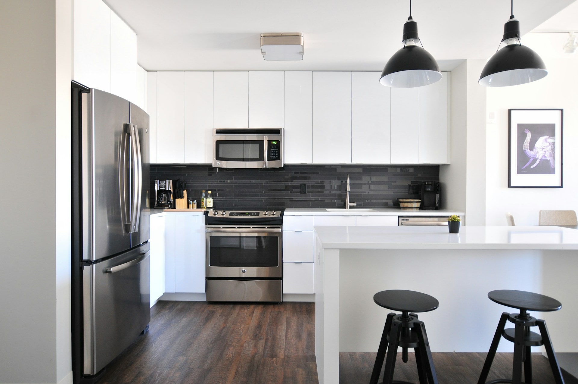 Contemporary kitchen remodel with minimalist design and modern finishes. KraftMaster Kitchen Renovations - New Jersey