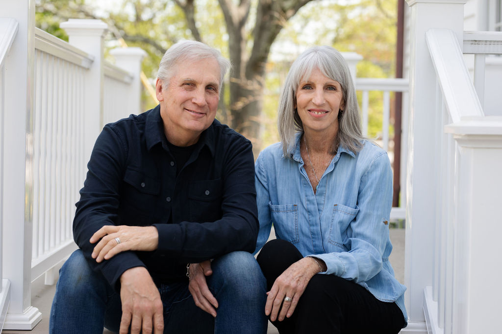 Bob and Julie Gockeler of KraftMaster Renovations, sitting outdoors