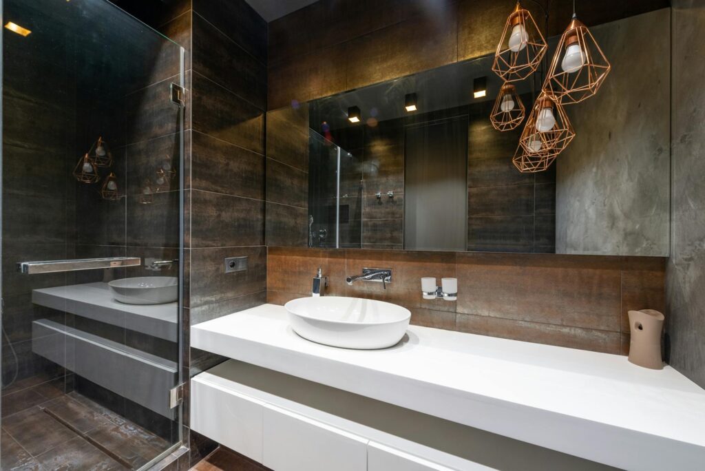 Contemporary bathroom with digital shower controls and integrated LED lighting