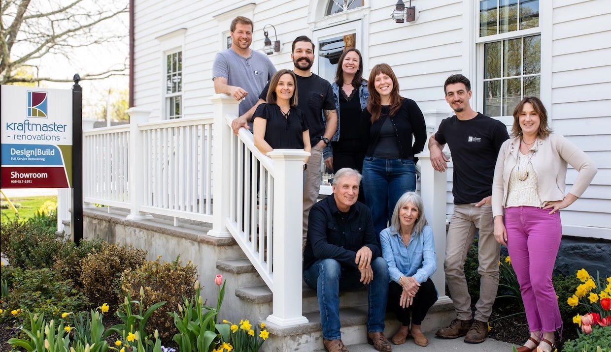 The KraftMaster Renovations team standing outside their New Jersey showroom.