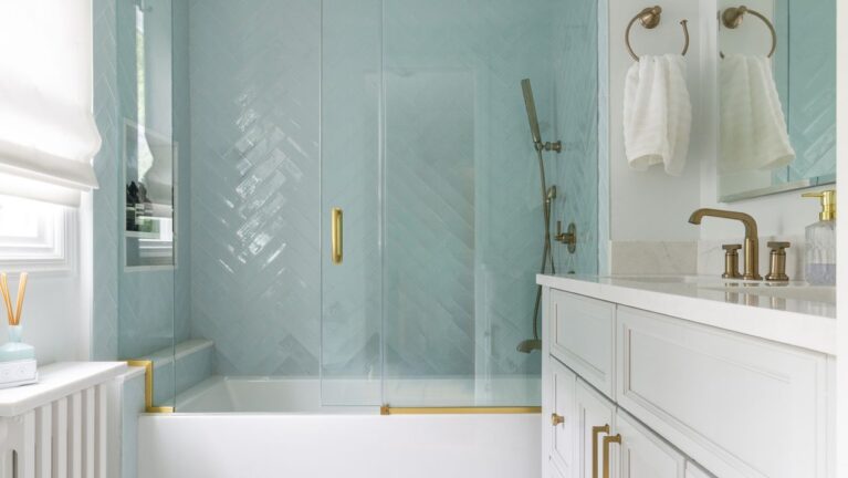 Chatham Hall Bath Remodel with Blue Herringbone Shower and Double Vanity